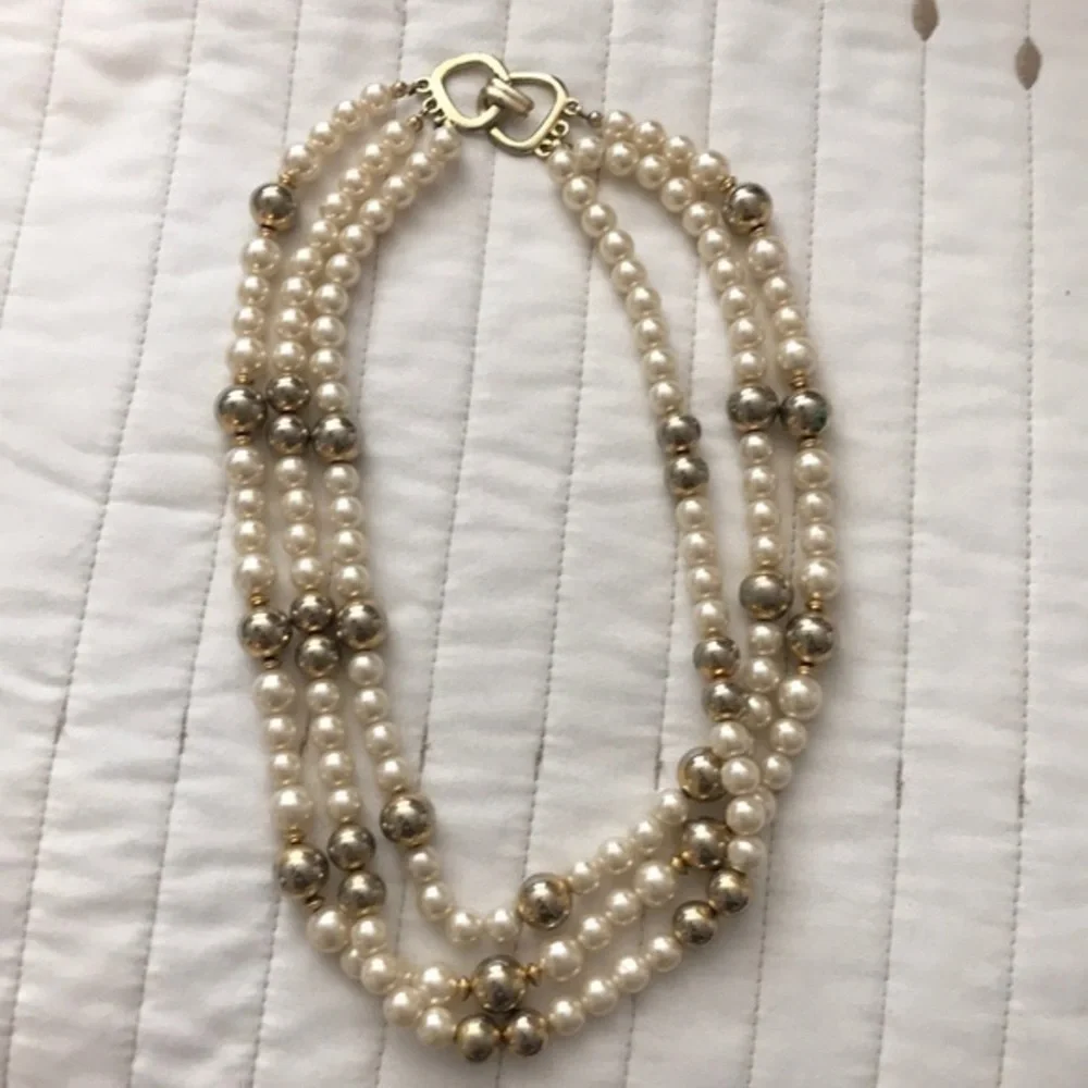 Costume jewelry triple layer faux pearl necklace